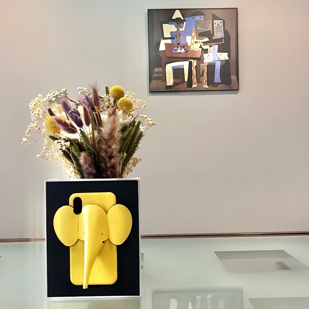Loewe Bright Yellow Elephant Leather Phone Case with strap and in box.